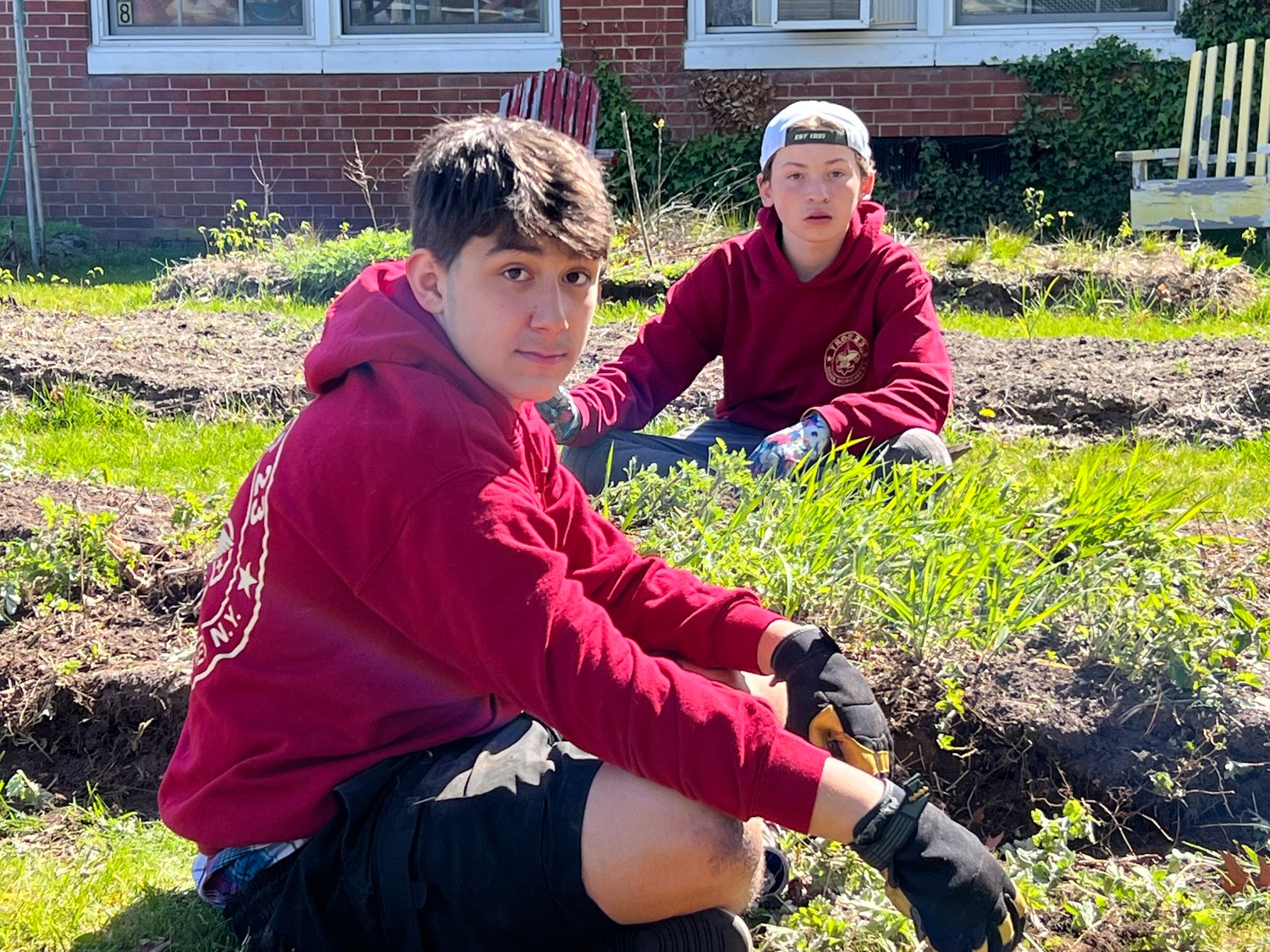 On Saturday, April 31, seven Boy Scouts from Troop 23 led the cleanup and rebuild of the Clayton Huey Community Garden named for former principal Kim Hardwick. The topsoil was purchased and donated by Suffolk Soil.